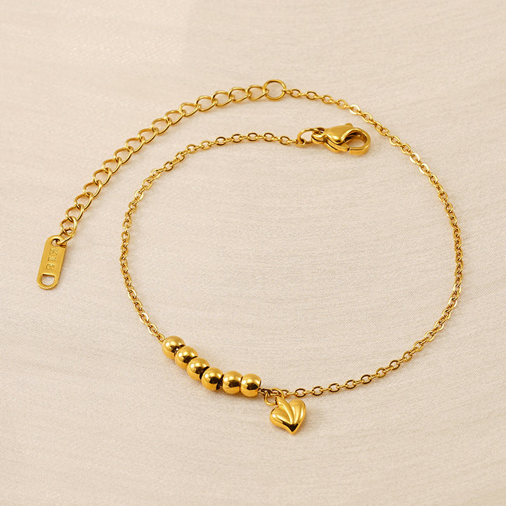 18k in acciaio in titanio nessuna donna bracciale sbiadante con cuori