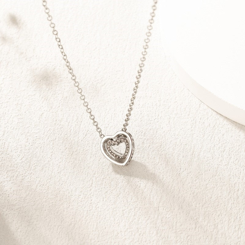 Japanse en Koreaanse minimalistische ketting met dubbele hart, modieuze en veelzijdige, volledige diamant holle kristal dubbele hart hanger, sleutelbeenketting