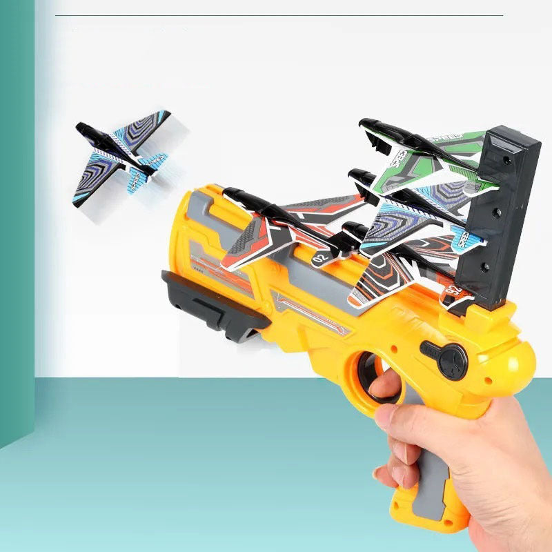 Barnens utomhuspojke leksaker hand kastande spin glider modell launcher