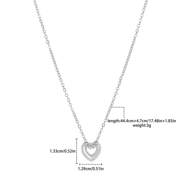 Japanse en Koreaanse minimalistische ketting met dubbele hart, modieuze en veelzijdige, volledige diamant holle kristal dubbele hart hanger, sleutelbeenketting