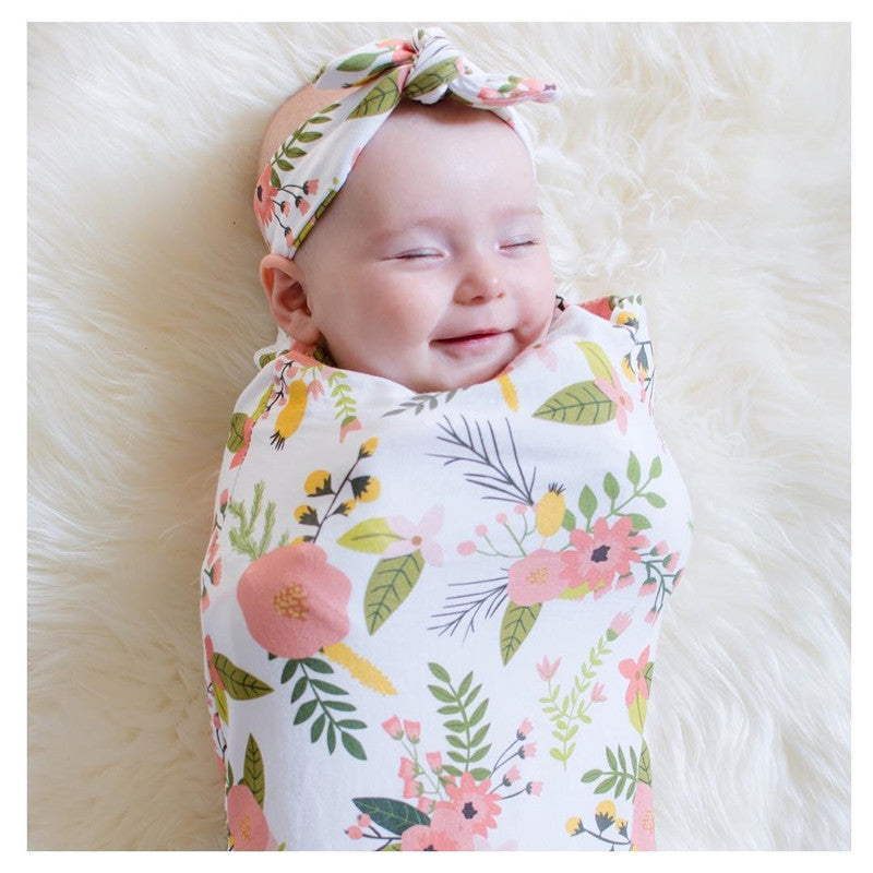 赤ちゃんのラップと毛布