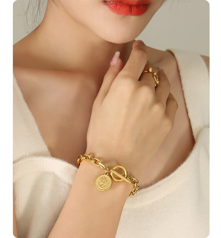 Weibliche Titanium Stahl Gold plattierte Textur Königin Porträt OT Schnalle Armband