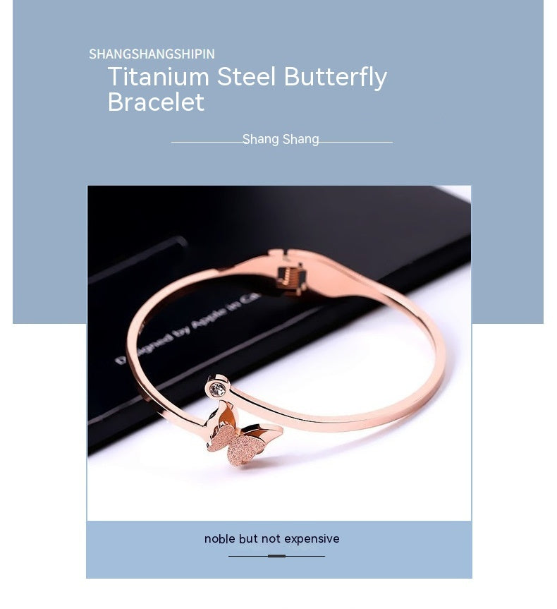 Pulsera simple de mariposa de acero de titanio de oro rosa