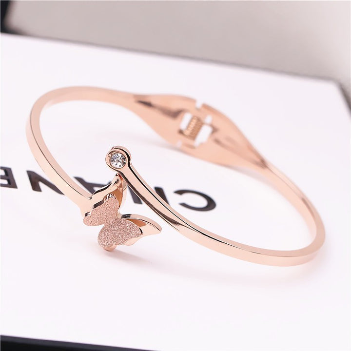 Bracelet simple femelle en acier en acier en or rose