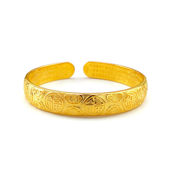 Rétro avec un bracelet plaqué d'or alluvial en ouverture