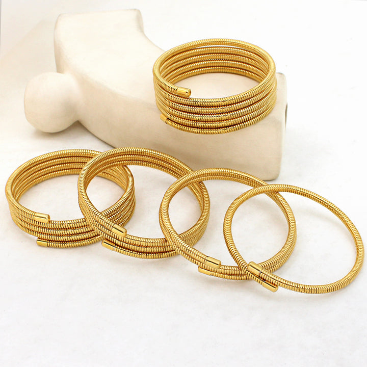 Pulsera de resorte de múltiples capas de oro de acero inoxidable de anillo