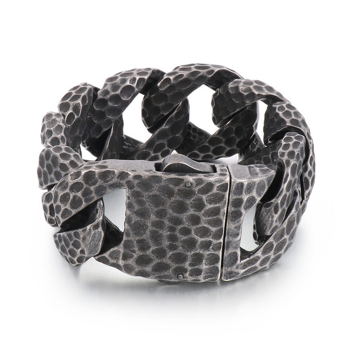 Snap -knop oude gekookte zwart beat -patroon titanium stalen armband