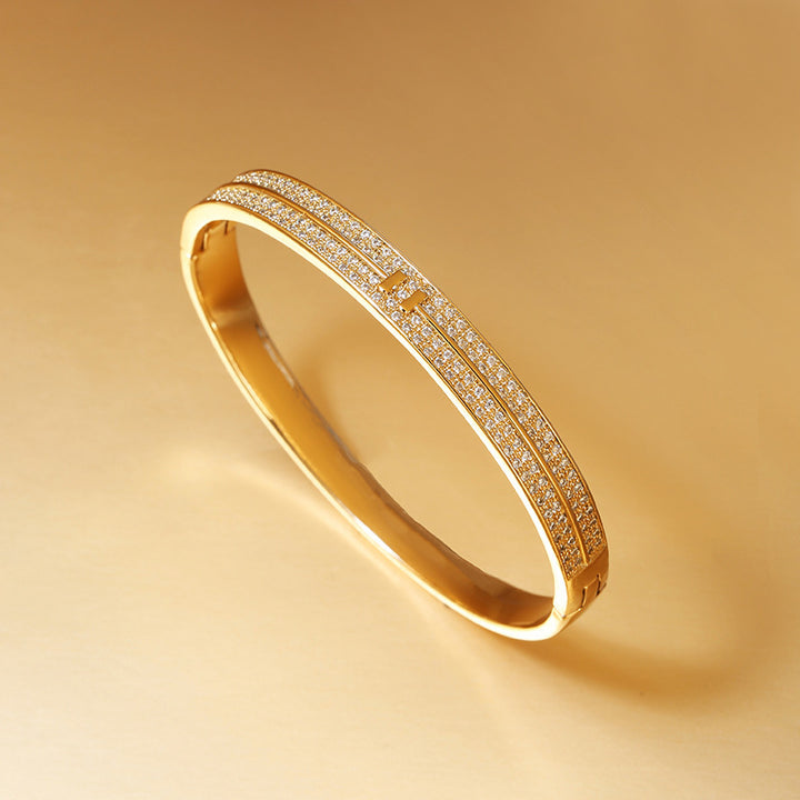 Gold plattiert eingelegtes Zirkoniumarmband einfache Persönlichkeit Hände