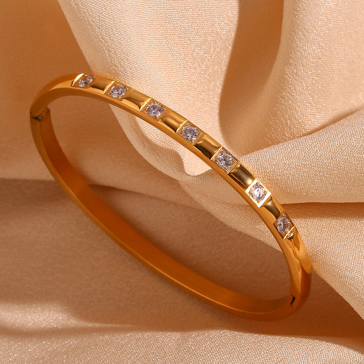 Personalidad elegante y simple de acero inoxidable shaped 18k Gold Micro incrustado Pulsera de hebilla de circón para mujeres
