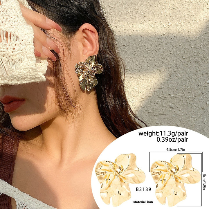 Boucles d'oreilles de goujon pliantes brillantes de design de mode pour femmes rétro