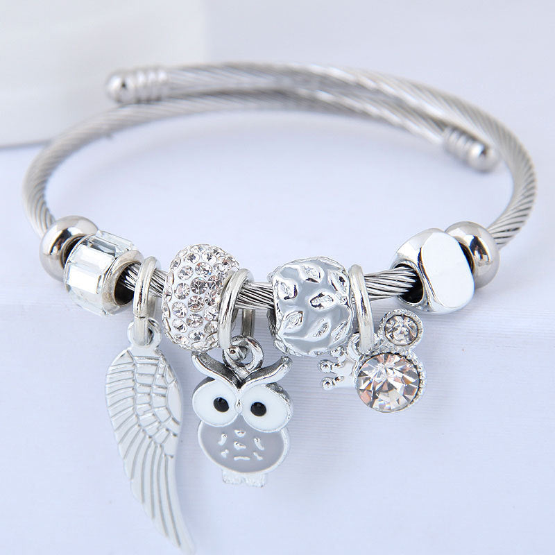 Sciatháin aingeal owl feirbthe DIY bracelet cruach dhosmálta pendant