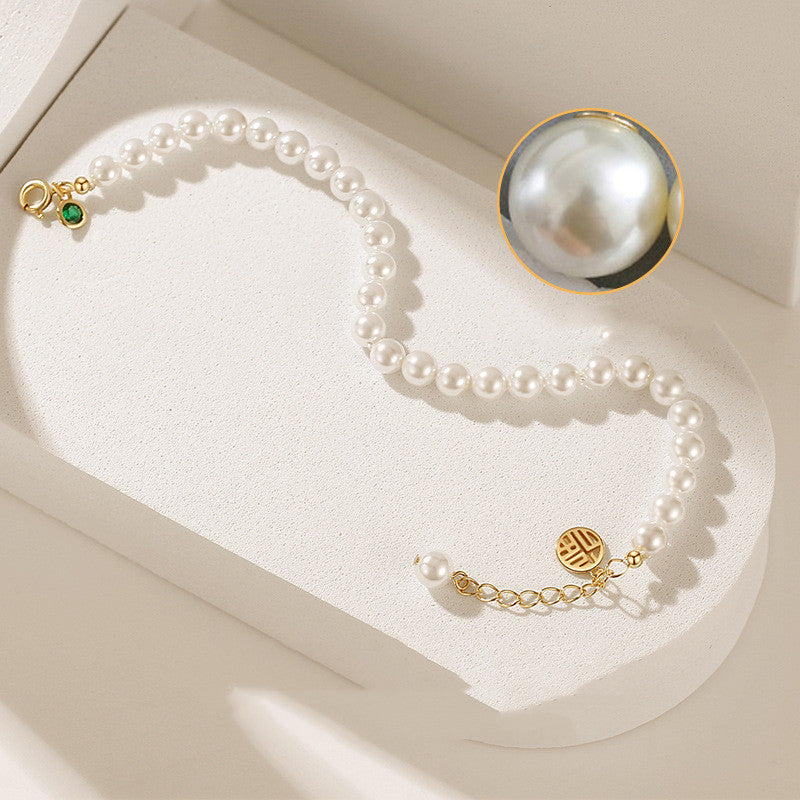 Bracelet de perles de coquille en argent sterling à la mode aux femmes