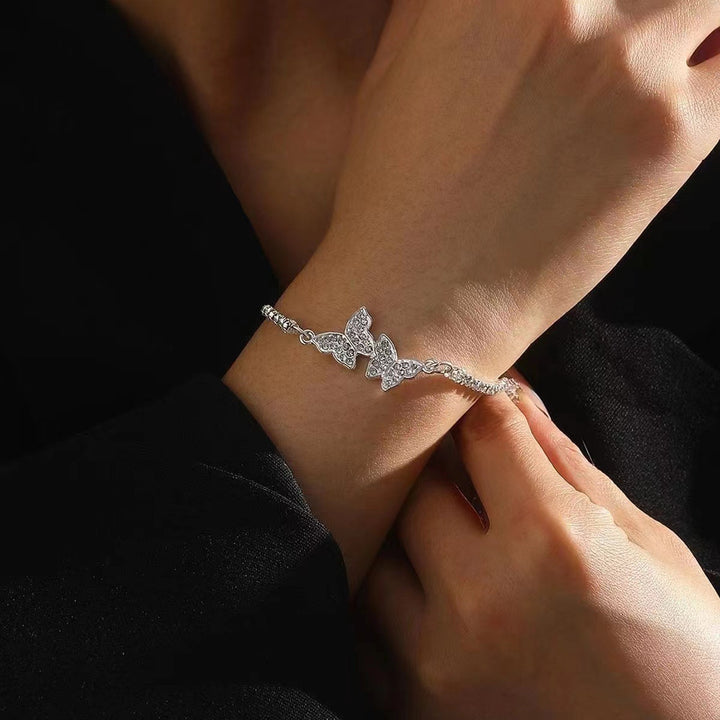 Bracelet de papillon clouté en diamant en diamant pour femmes