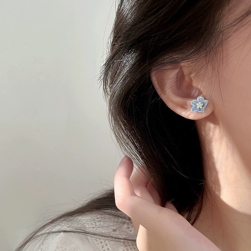 The Blue Flower Stud Earrings Are Delicate And Small