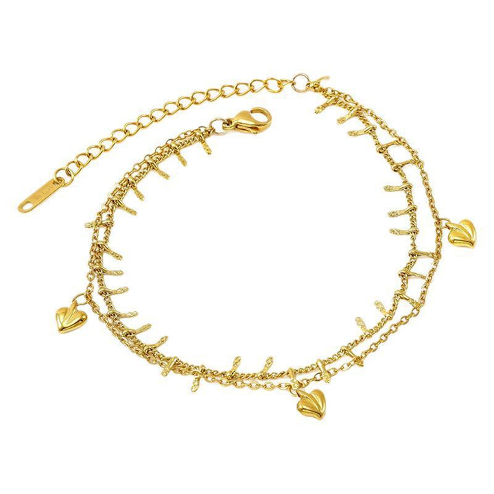 18k in acciaio in titanio nessuna donna bracciale sbiadante con cuori