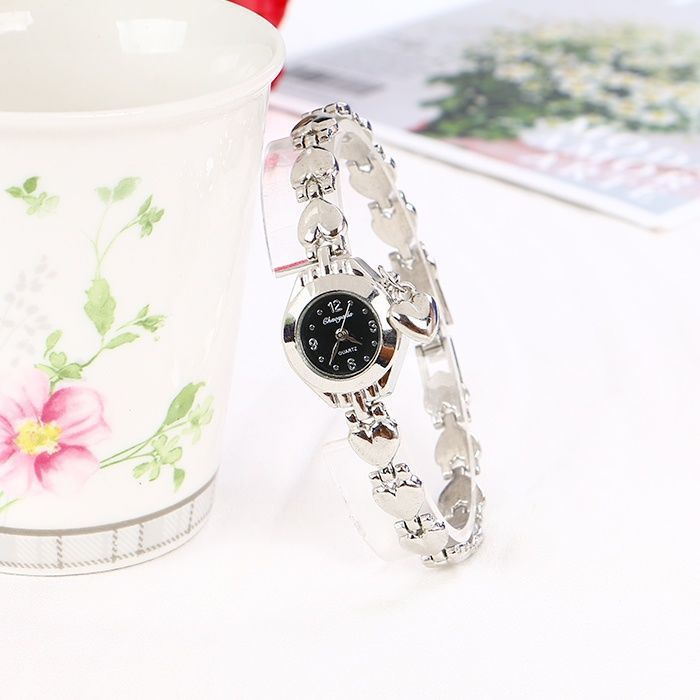 Pulsera de corazón de cinturón de acero de cuarzo reloj para mujeres