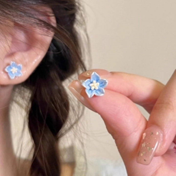 The Blue Flower Stud Earrings Are Delicate And Small