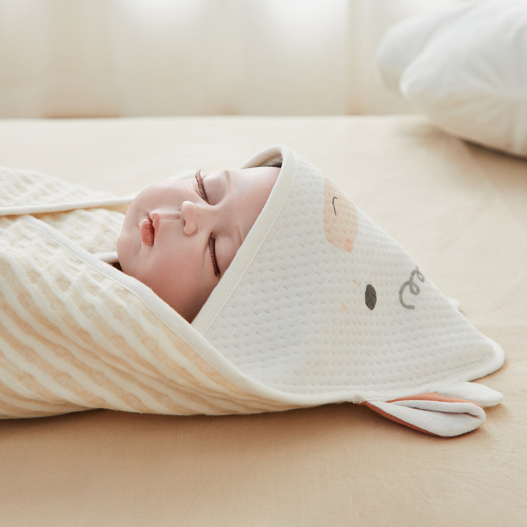 Anti-startle dyne for nyfødte babyer