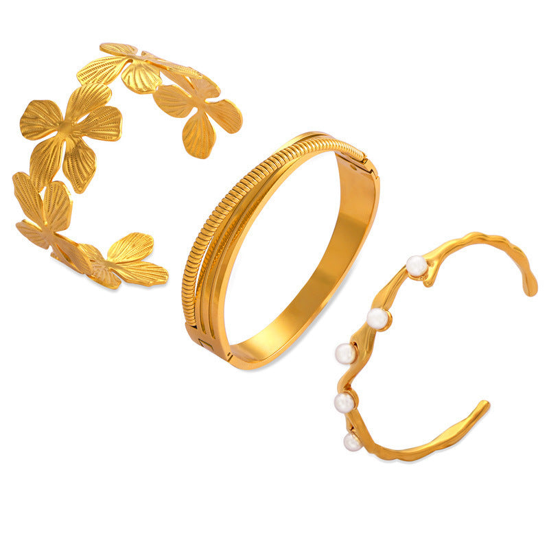 Brazalete de estilo pastoral chapado en oro de acero titanio