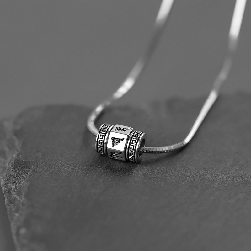 Diseño de collar de mantra de seis palabras colgante rotativo de acero titanio