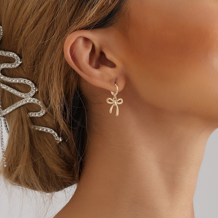 Boucles d'oreilles en métal à arc géométrique pour femmes