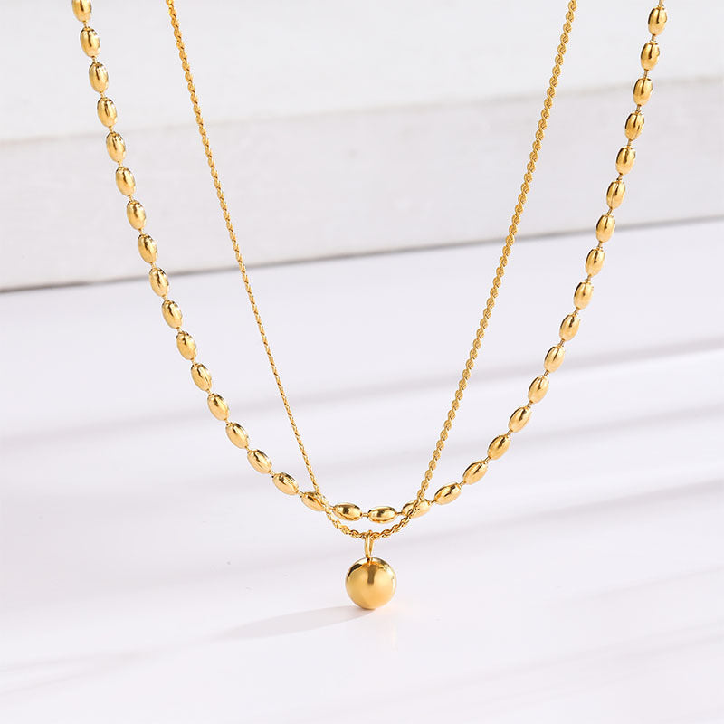 Einfache Nische runde Perlen kleine goldene Bohnen Doppelschicht Titanstahlkette für Frauen