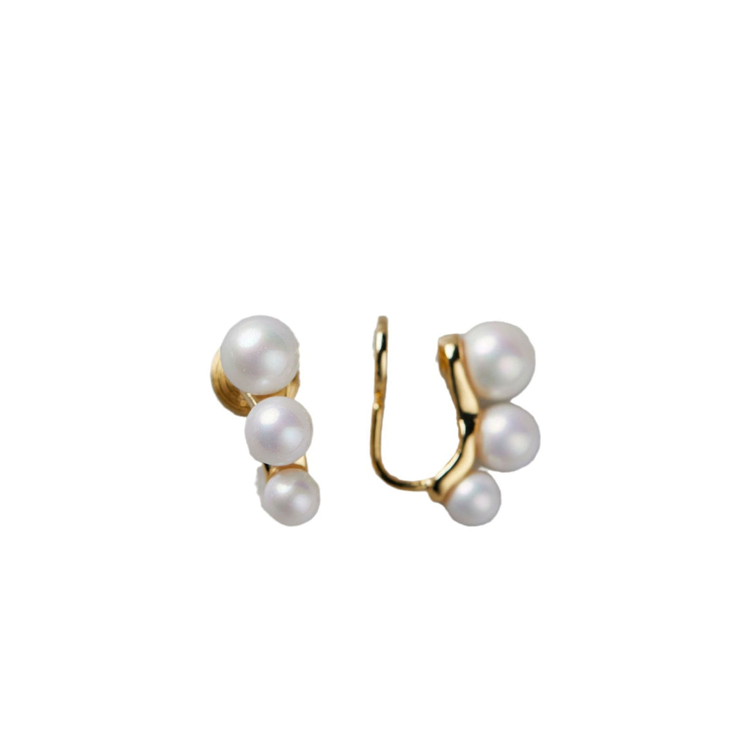 Boucles d'oreilles de perles de femmes vintage de bobine de moustique