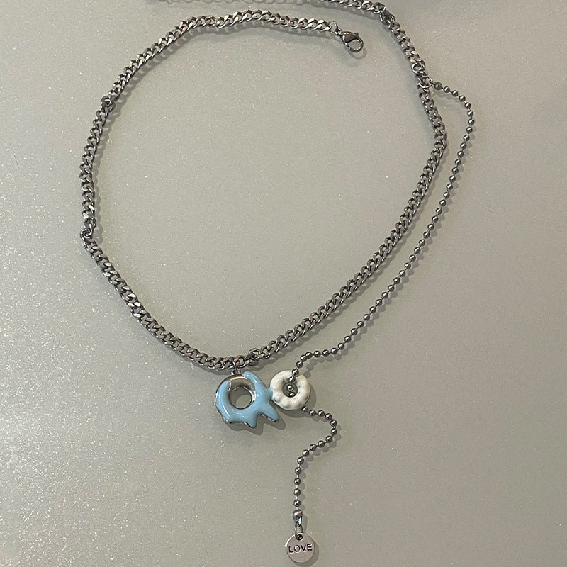 Collier à gland beignet bleu et blanc