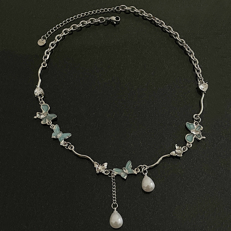Ожерелье из жемчужного кисточка с бабочкой
