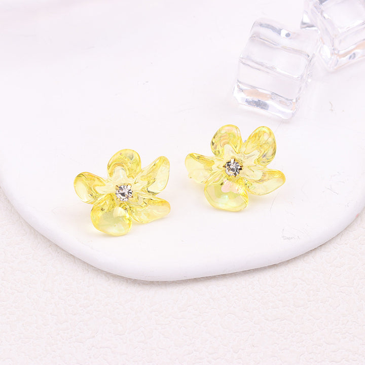 Boucles d'oreilles acryliques de petite fleur