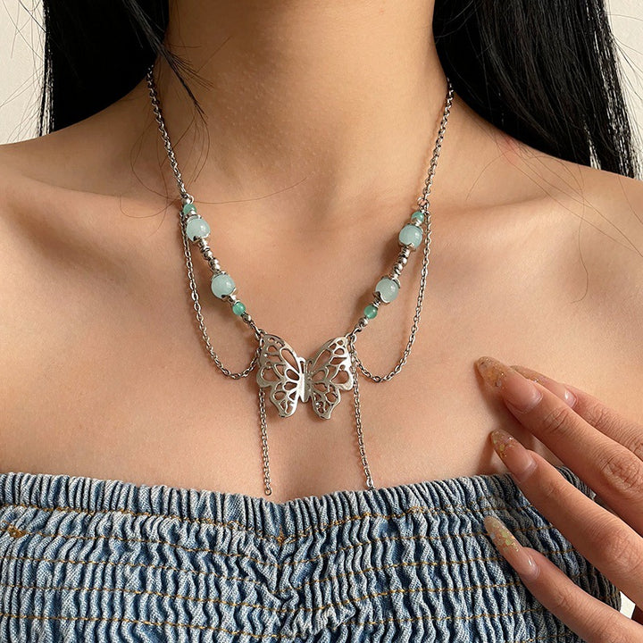 Neue chinesische Perlen Schmetterling Quasten Halskette