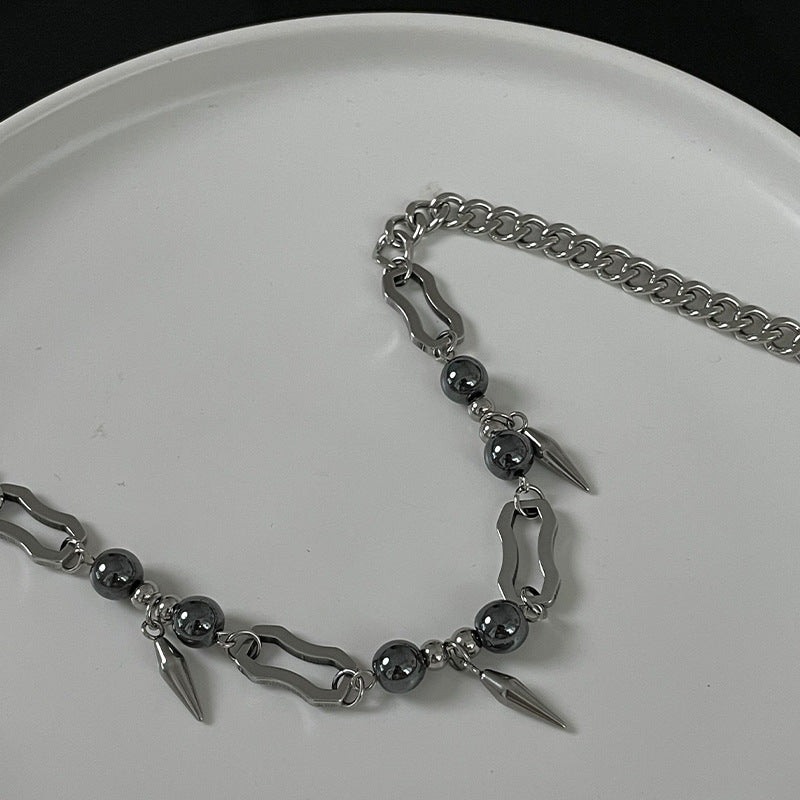 Europäische und amerikanische Titan -Stahlnietniete runde Perlen Halskette