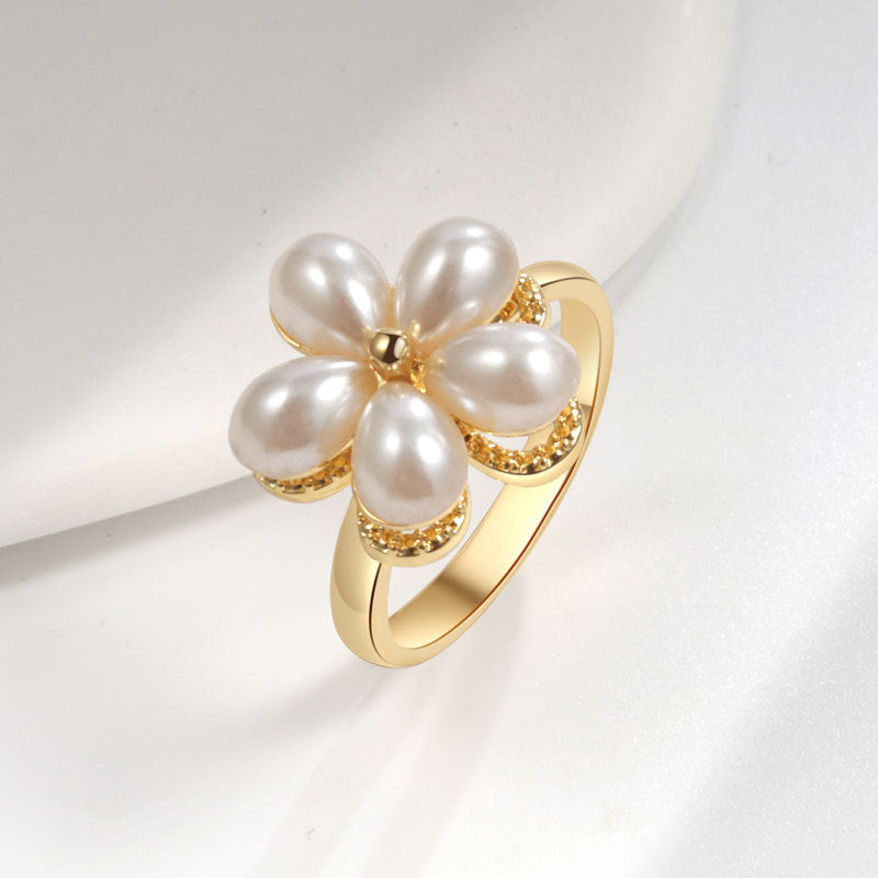 Personalidad de la moda del traje de anillo de perlas giratorias