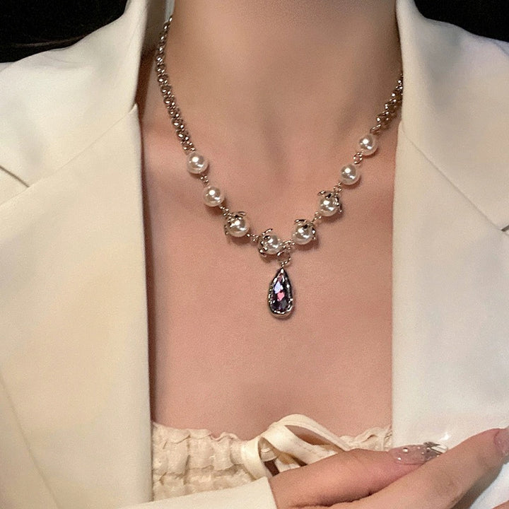 Collar de costura de perlas de gotas moradas para mujeres