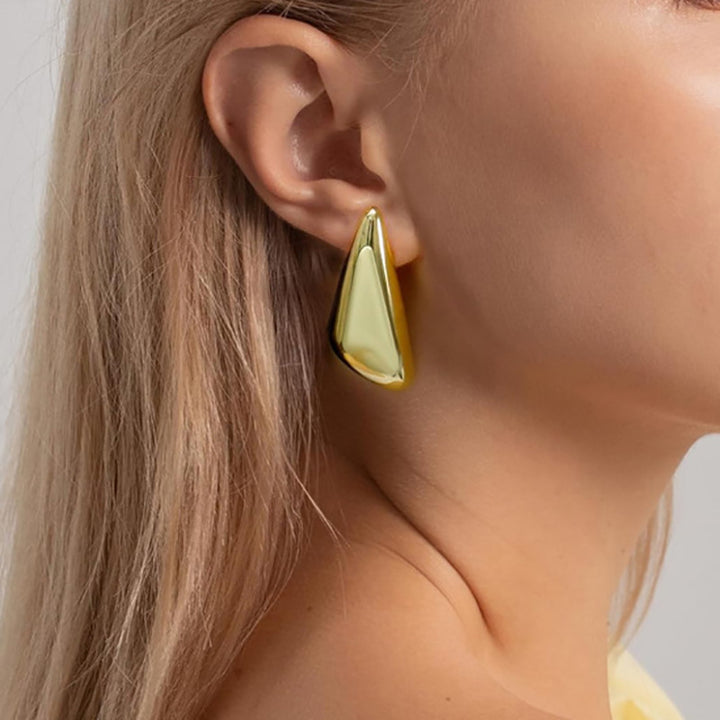 Boucles d'oreilles de goujon pliantes brillantes de design de mode pour femmes rétro