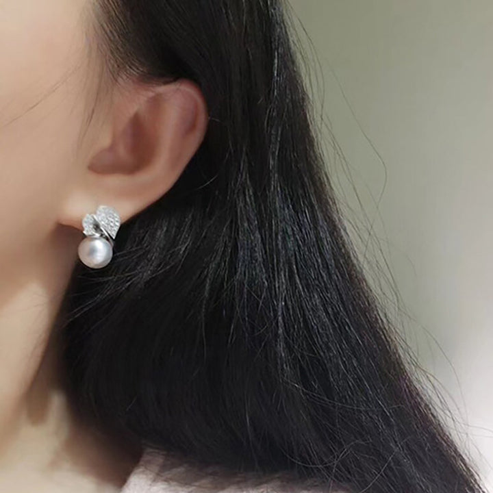 Boucles d'oreilles à feuilles exquises Design de mode perle