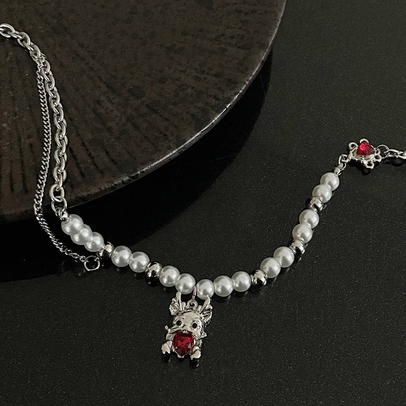 Hochwertiger Perlennähtegreifer-Drachen-Halskette