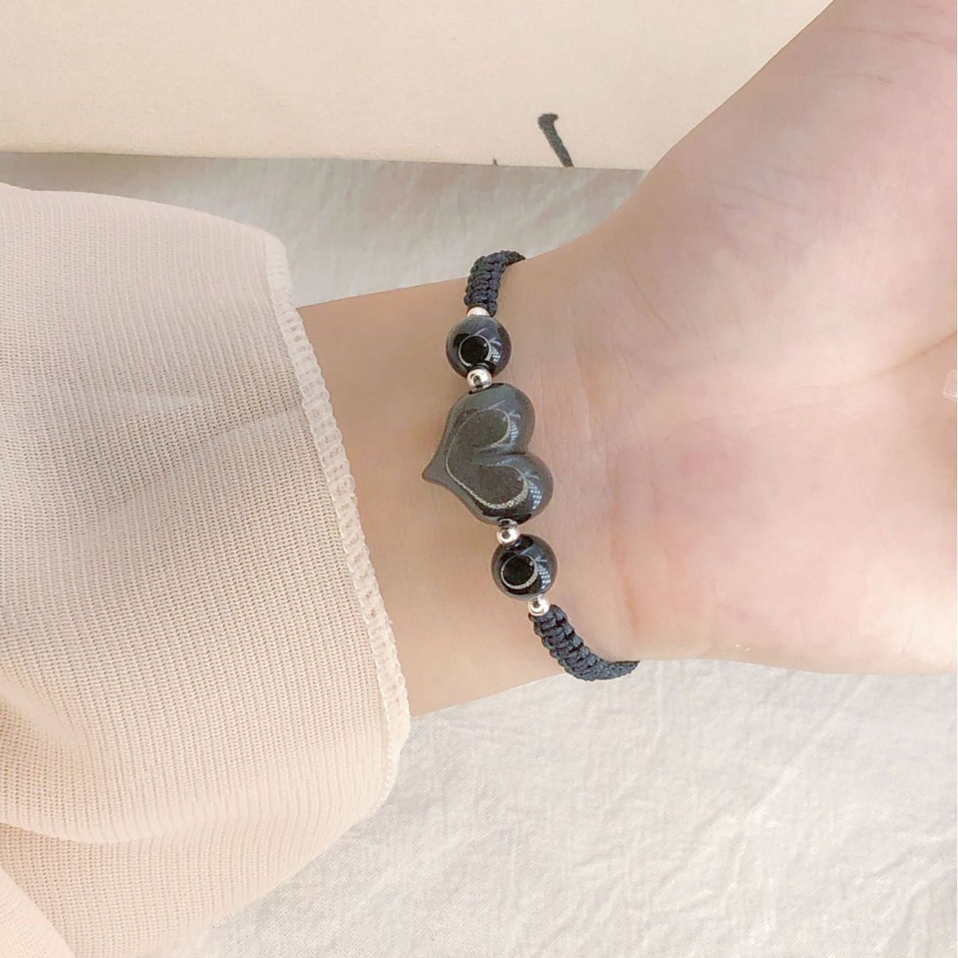 Bracelet tissé en pierre argentée coeur de pêche noire noire
