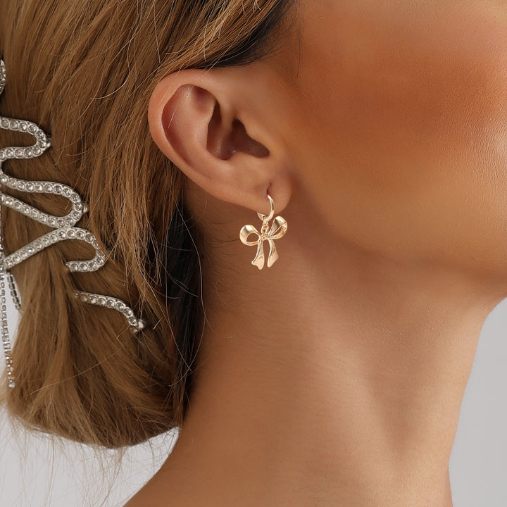 Boucles d'oreilles en métal à arc géométrique pour femmes