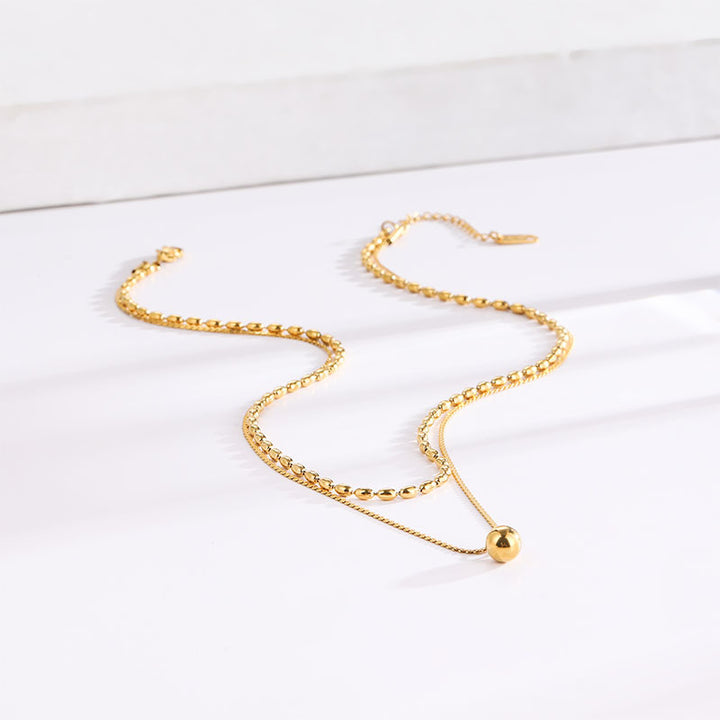 Einfache Nische runde Perlen kleine goldene Bohnen Doppelschicht Titanstahlkette für Frauen