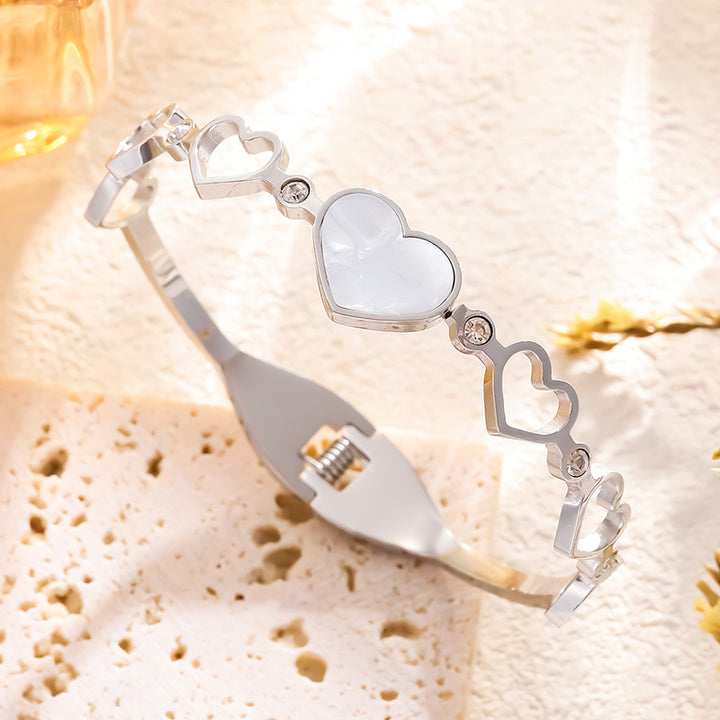 Diamante de acero de titanio femenino encantador brazalete de concha blanca