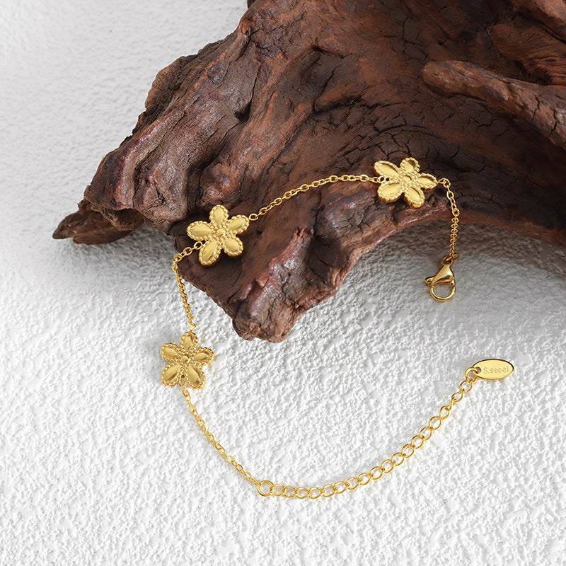 Bracelet et collier à fleurs rondes de niche