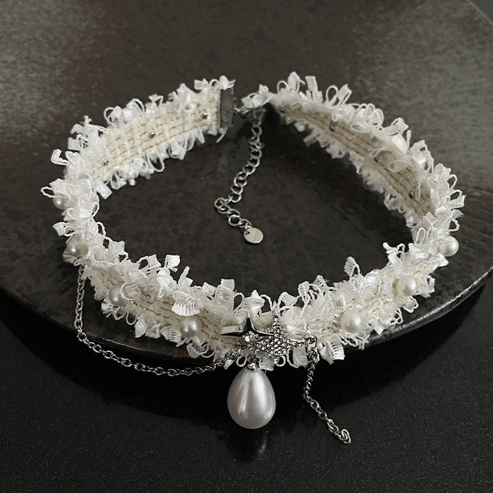 Weißer Spitzen -Asterismus Perle Quasten Halskette