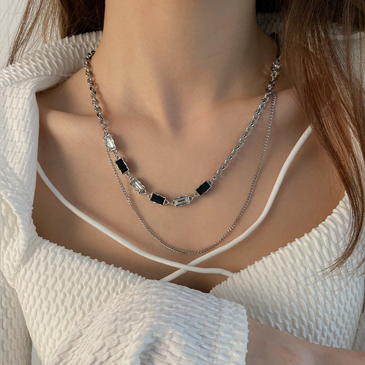 Különleges kamatozású fekete-fehér gyémánt kettős nyaklánc