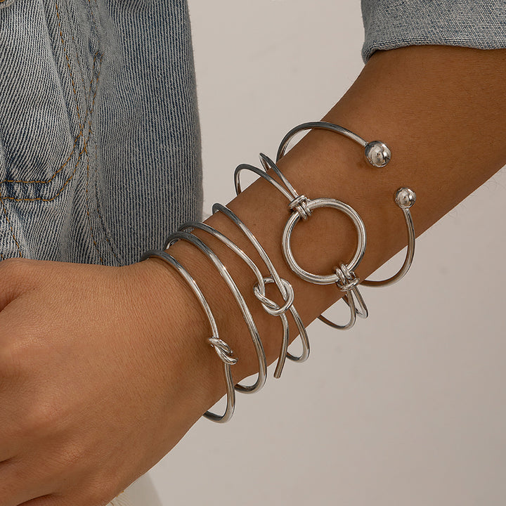 Ontwerp dubbele laag holle knoop open bracelet vrouwen