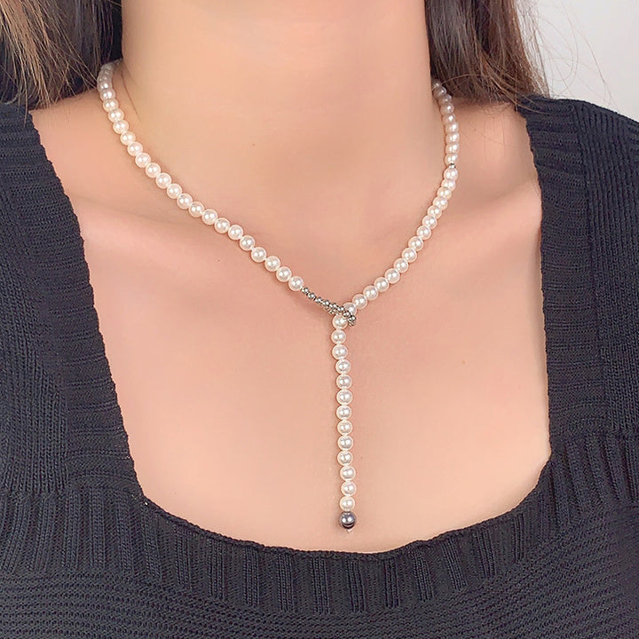 925 Серебряное серебро Простые высококлассные ожерелье женского пола Shijia Shell Pearls Special Interest Design подтягивание