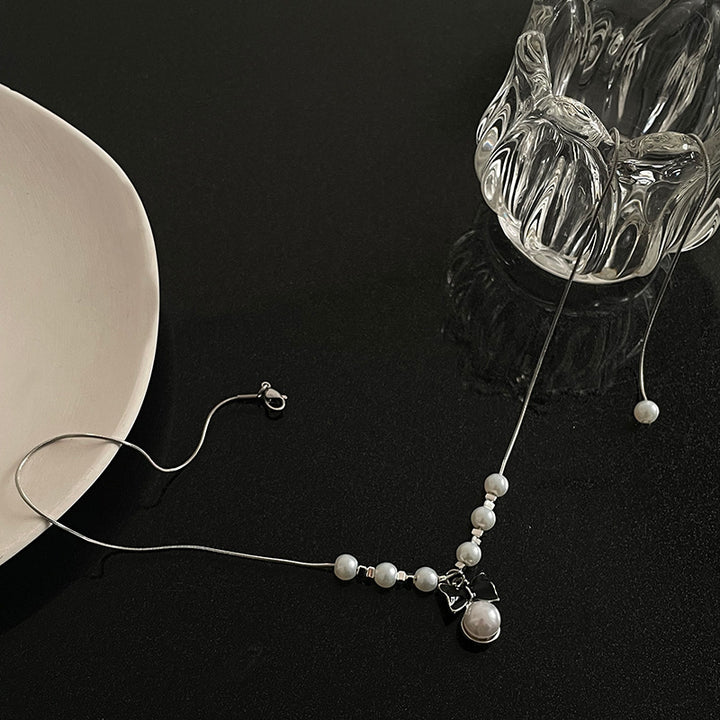 Collier de perle de couture à l'arc pour femmes conception d'intérêt spécial