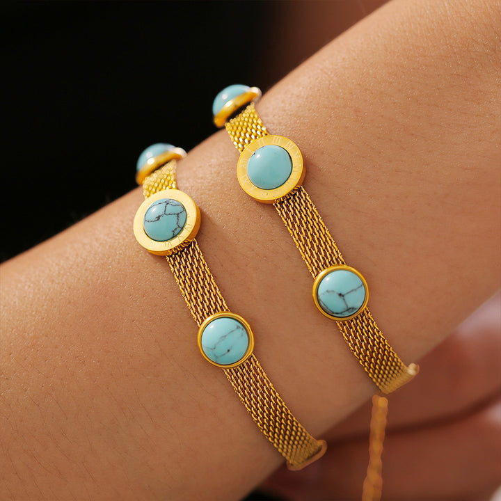 Europäischer und amerikanischer Stil neues breites Oberflächennetz runde Marke Turquoise Armband Retro Persönlichkeit Design Titanium Stahl plattiert 18k Goldzubehör