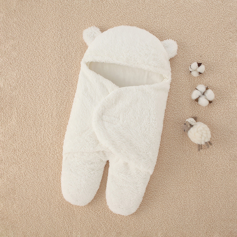 Sovepose for spedbarn som skal holdes av nyfødt