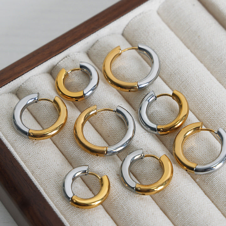 Pendientes de anillo redondo de acero de titanio simple Mujeres